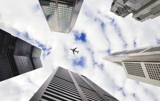 airplane-above-building